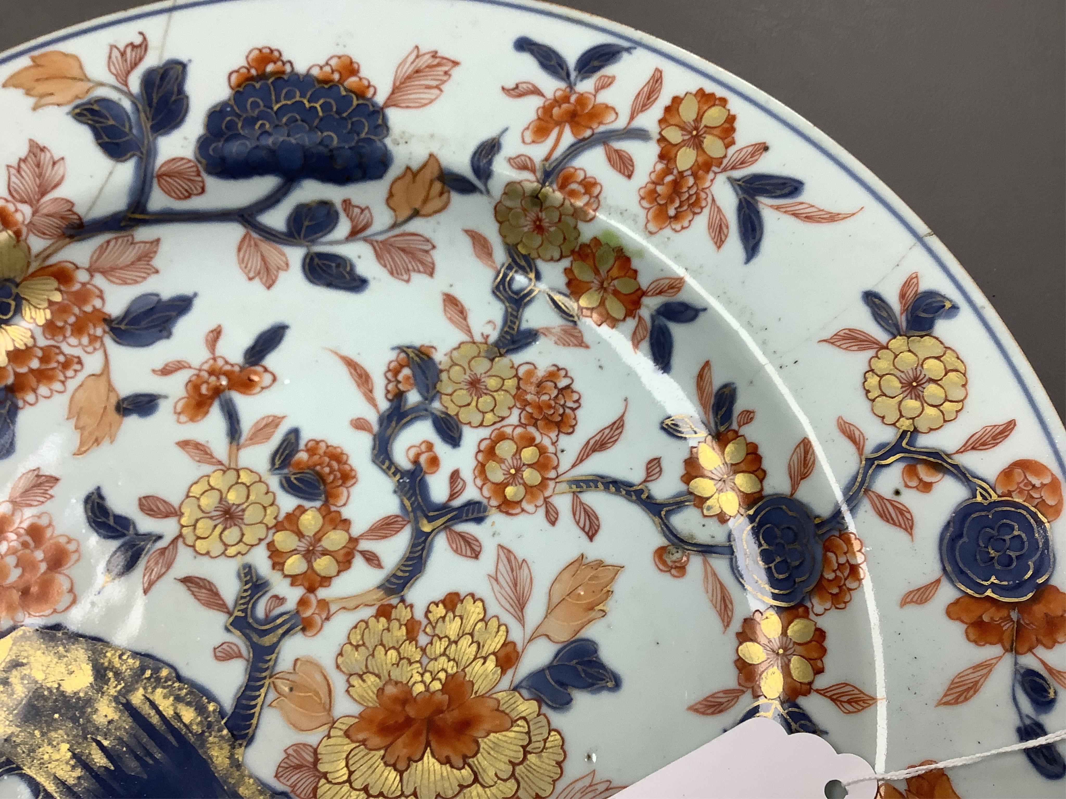 Three early 18th century Chinese Imari dishes (one clobbered), largest 46.5cm, together with a 19th century Chinese powder blue ground vase, 44cm high and a horn carving, 13.7cm (5)
